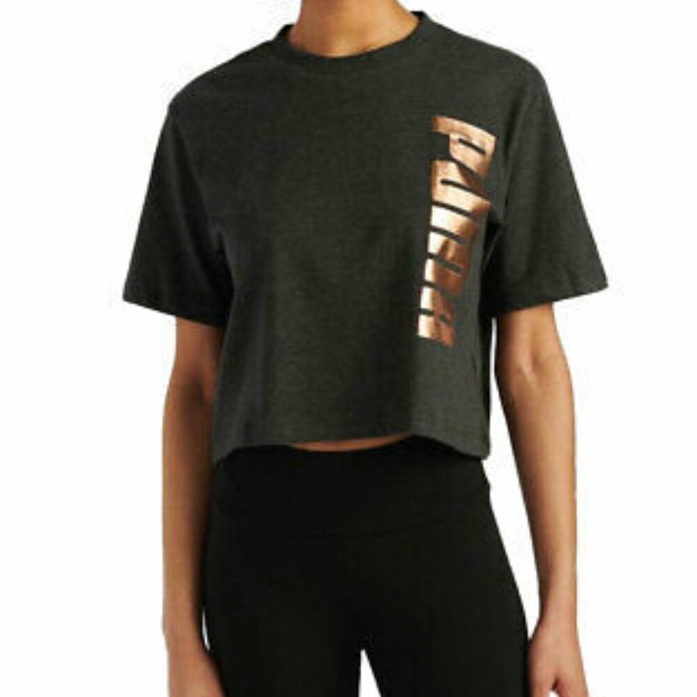 Puma women's cropped t-shirt with a rose gold vertical logo.  Sz L. Cotton mix.